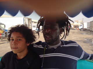 Intercultura - Capitolo 12 Ricordi di viaggio, Modou Gueye con suo figlio Bibo, 2013