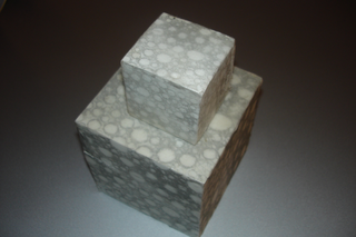 Collezione 2000 - 2010, Andrea Melloni
Polycubo amellario, 2000
2 cubi, encausto su lambda 
10 x 10 x 10 cm e 5 x 5 x 5 cm