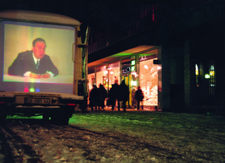 Maja Bajevic, Avanti Popolo, Maja Bajevic, The Speaker, 1998, action, video installation shown on the back of a mobile van, flyers / photographs.
Sarajevo Winter Festival ’98, SCCA, Sarajevo, Bosnia and Herzegovina (Curator Dunja Blazevic), 1998.

Photo documentation: Dejan Vekic